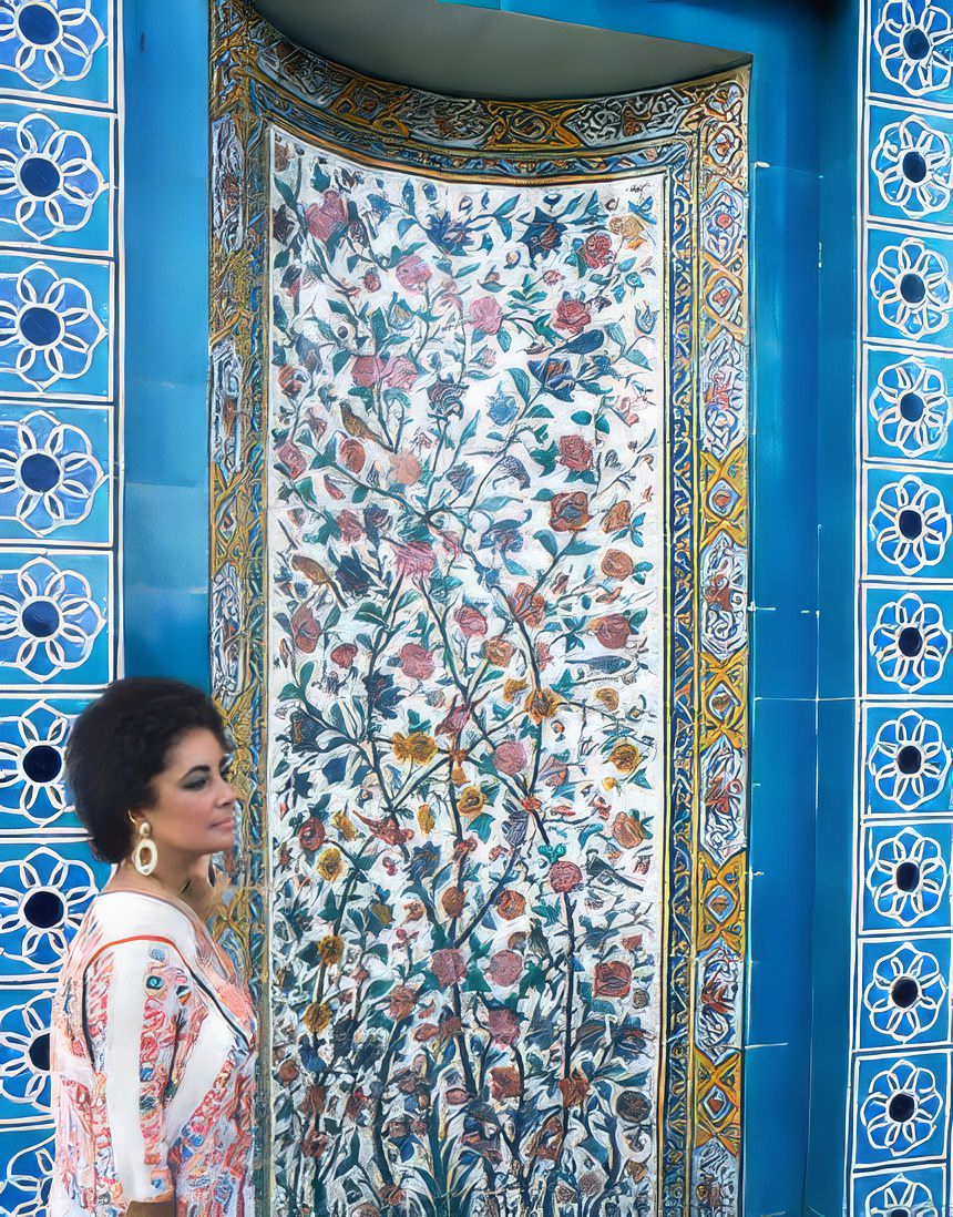 #6 In profile in front of dazzling mosaic and tile work, Taylor stands by the tomb of the poet Sa’di