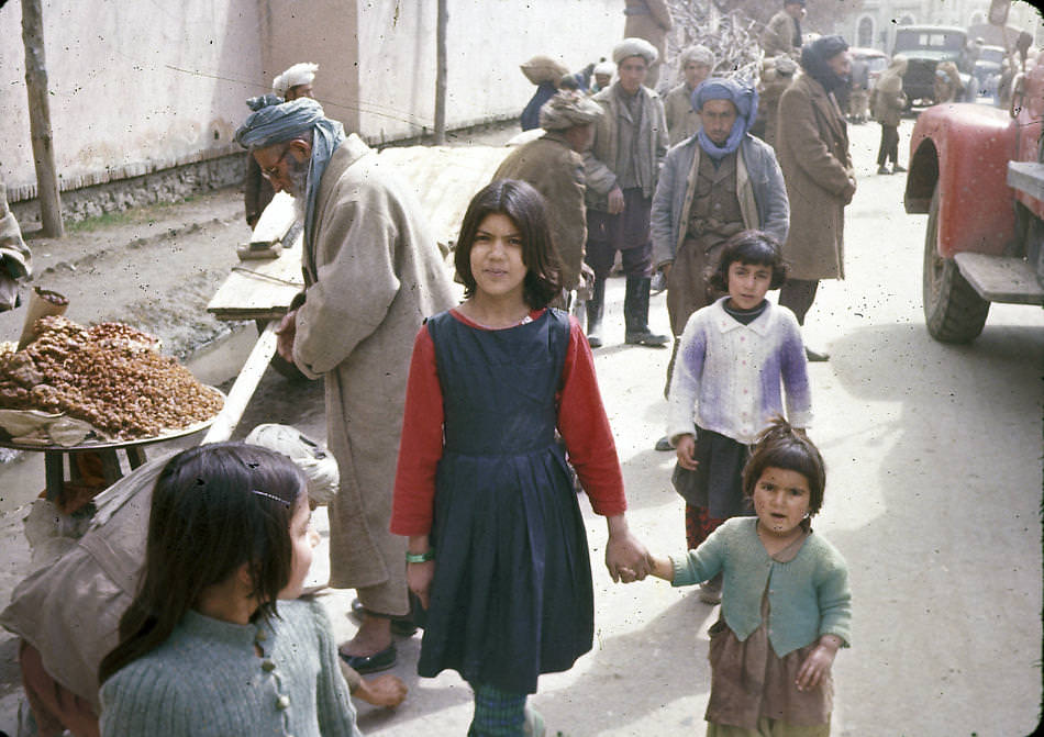 #28 Sisters pose for a photograph in Kabul.