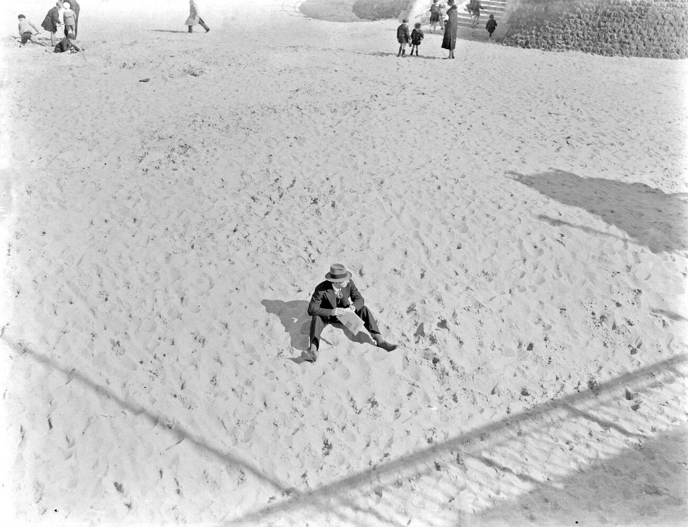 #11 A gentleman on the deserted beach of Scheveningen, 1930s.