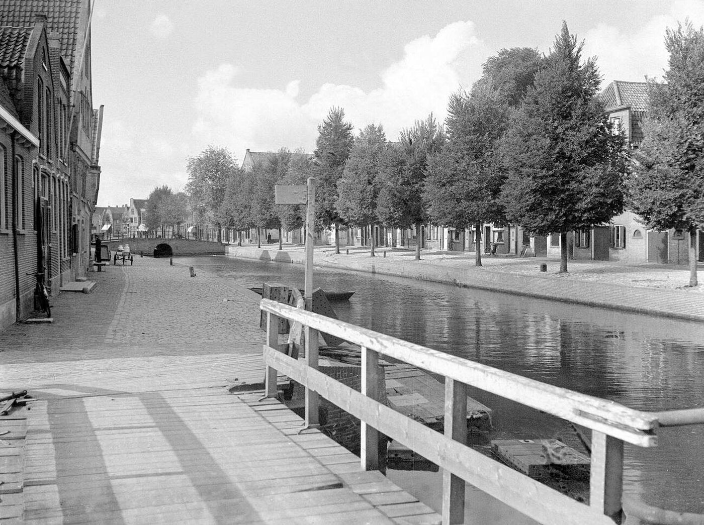 #38 Canals, boats and streets in Holland.