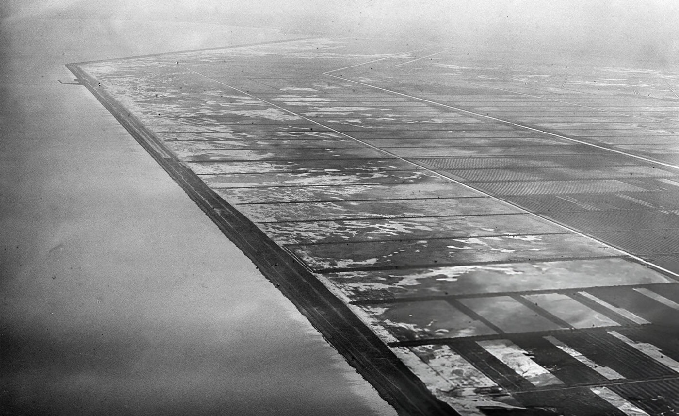 #73 Holland The draining of the Zuiderzee, aerial view of the first artificial levees, 1931.