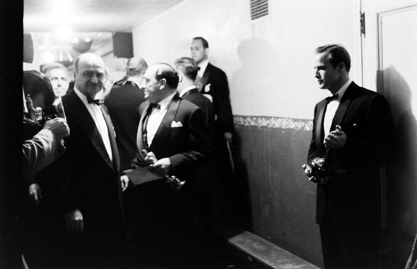 #11 Marlon Brando (right) with his Oscar for On the Waterfront, 1955.