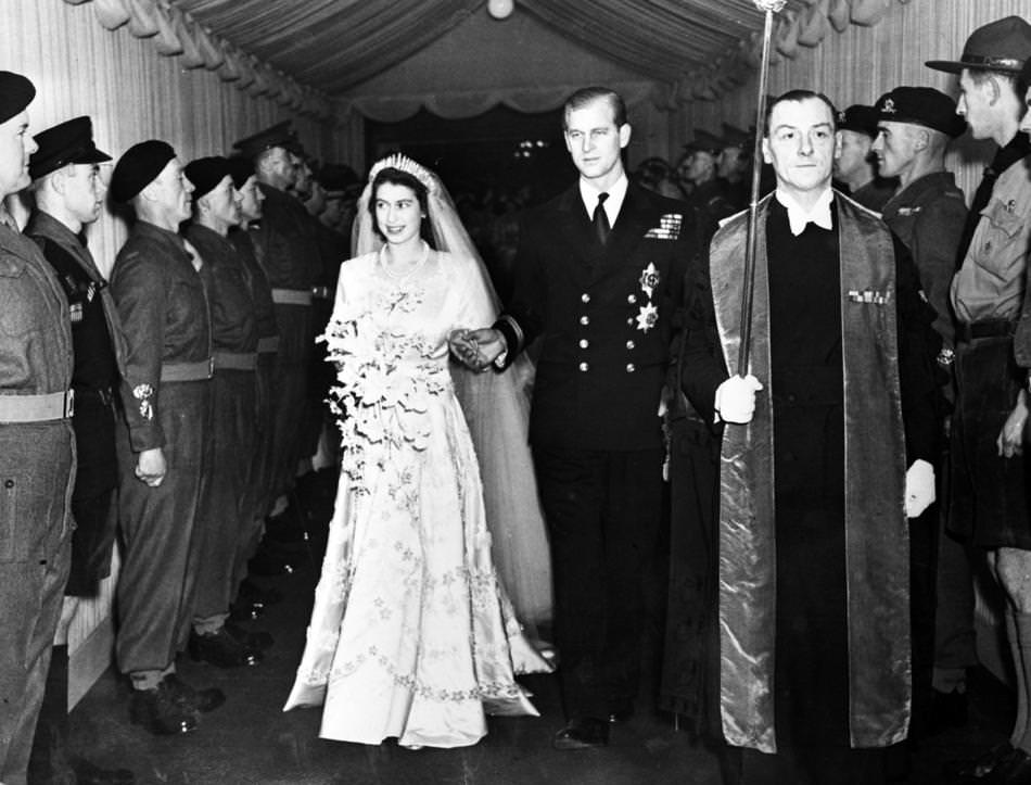 #1 Britain’s Princess Elizabeth and her husband the Duke of Edinburgh are seen leaving Westminster Abbey, London, on Nov. 20, 1947, following their wedding service.