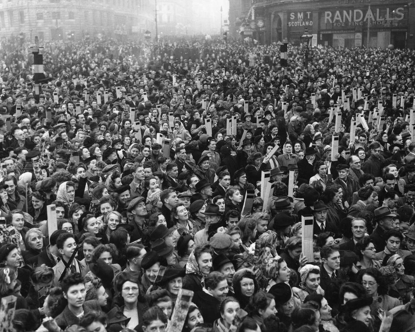 #20 Crowd in Trafalgar Square looking through periscopes at the royal wedding of Princess Elizabeth to Lieutenant Philip Mountbatten, Duke of Edinburgh, 1947.