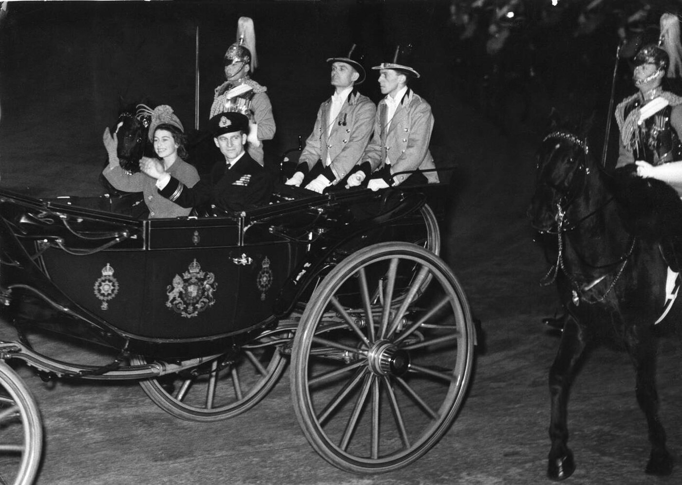 #31 HRH Princess Elizabeth and the Duke of Edinburgh leave Buckingham Palace for their honeymoon, 1947.