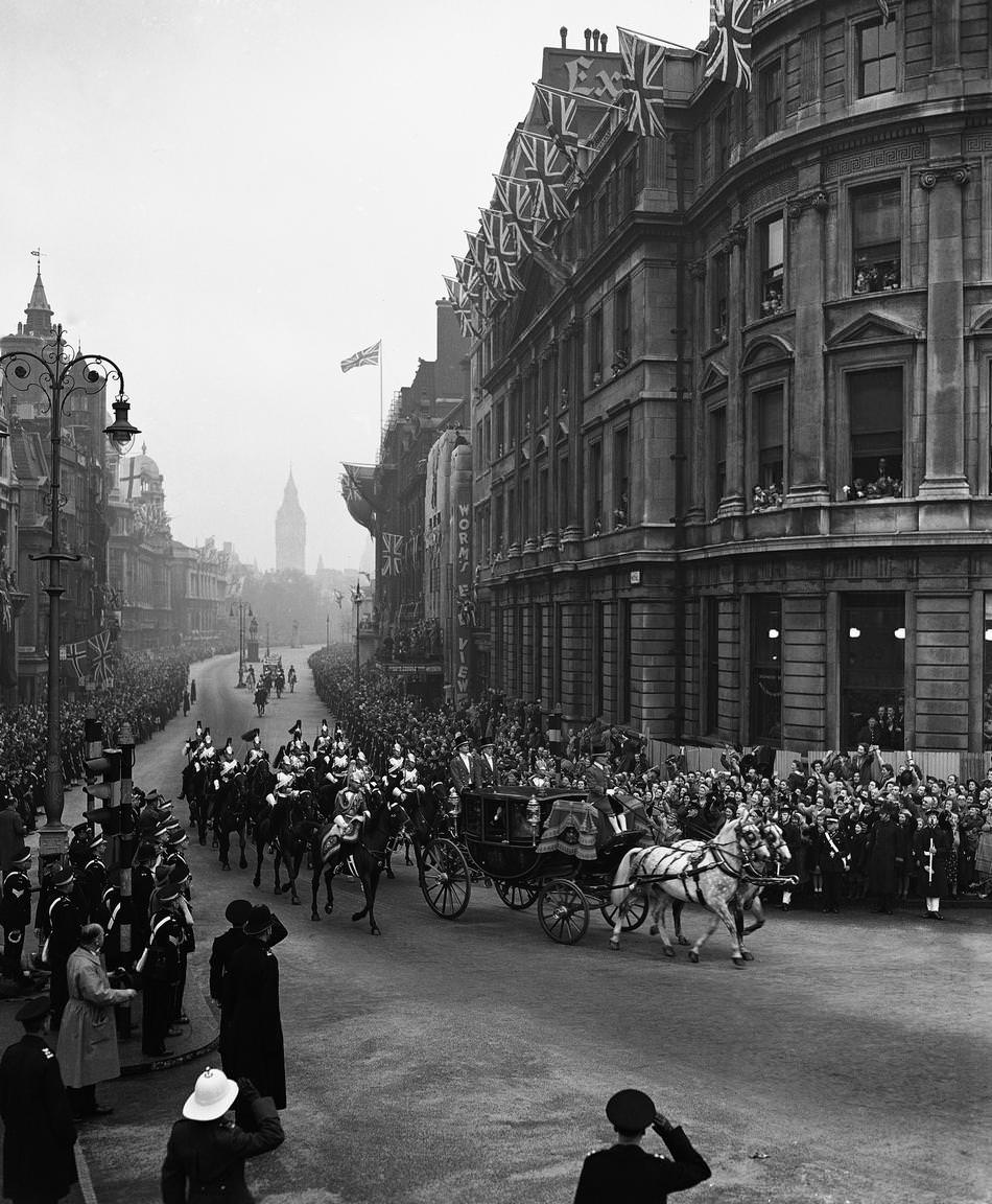 #4 The glass coach, containing the royal newly-weds, Princess Elizabeth and the Duke of Edinburgh, accompanied by an escort of the Household Cavalry, is seen coming up Whitehall towards Admiralty Arch on their way back to Buckingham Palace after their marriage at Westminster Abbey, London on Nov. 20, 1947.