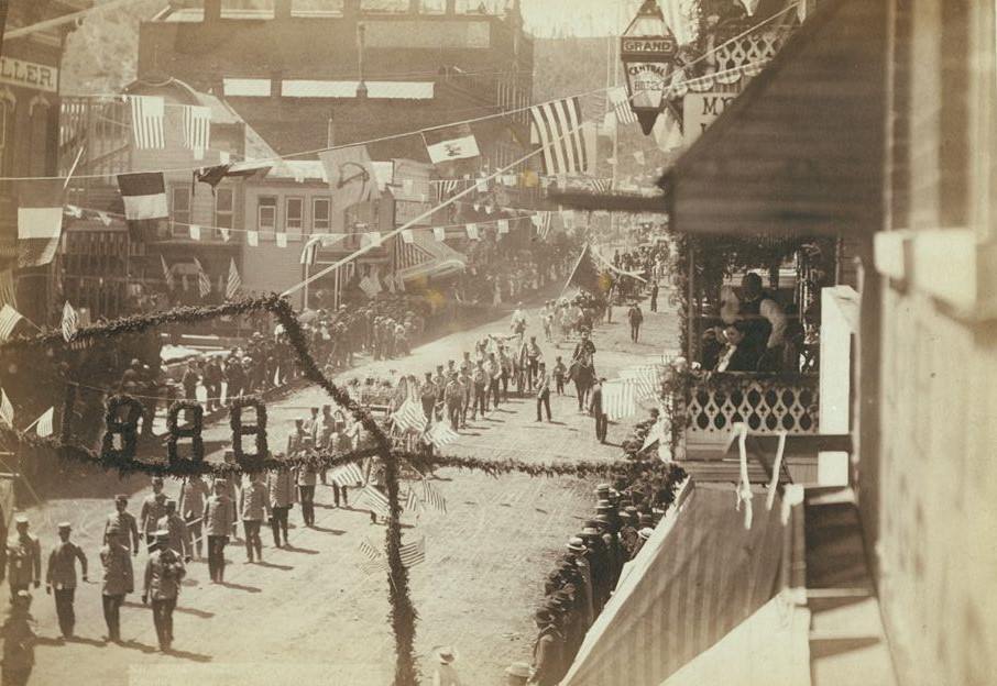 #98 People of Deadwood celebrating completion of railroad, 1888.