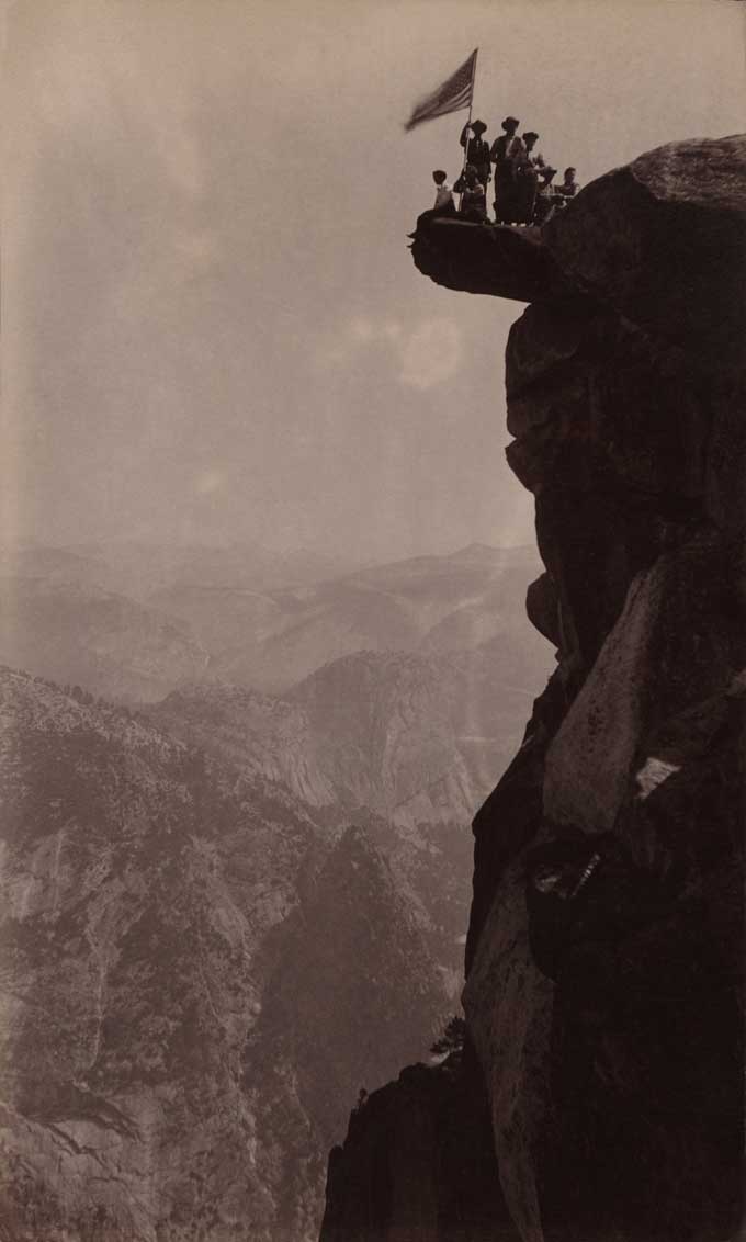 #6 Tourists with an American flag at Glacier Point, Yosemite National Park, 1890’s.