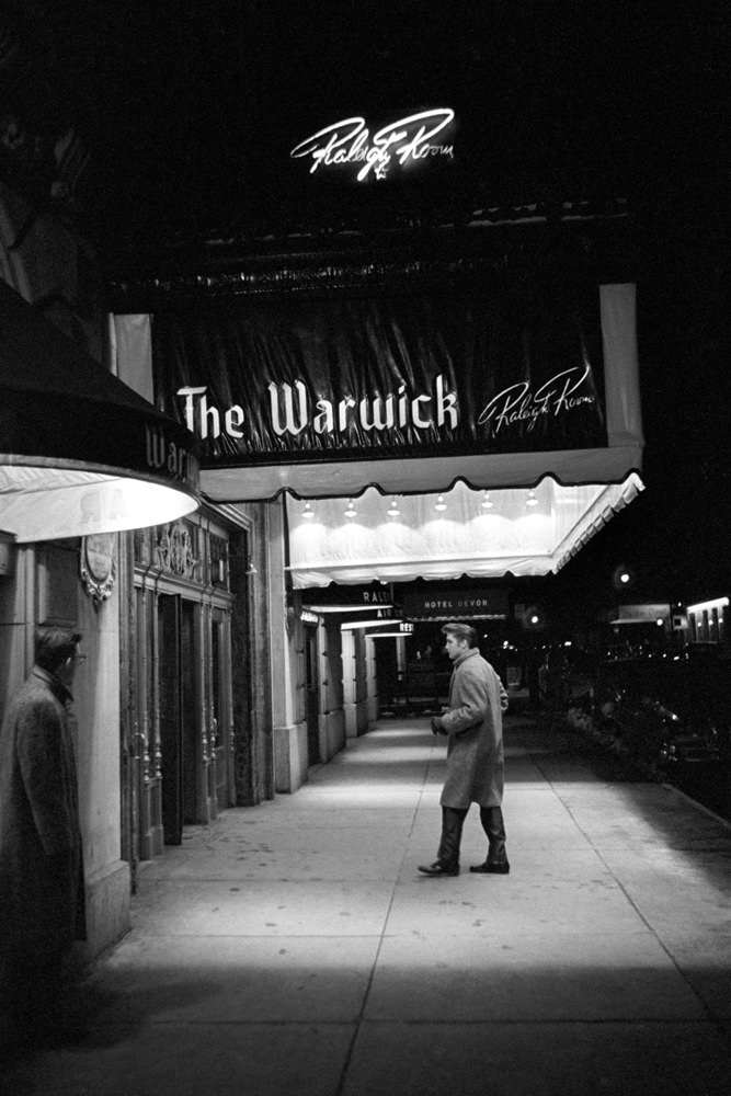 #1 Elvis walking into The Warwick Hotel in New York, 1956.