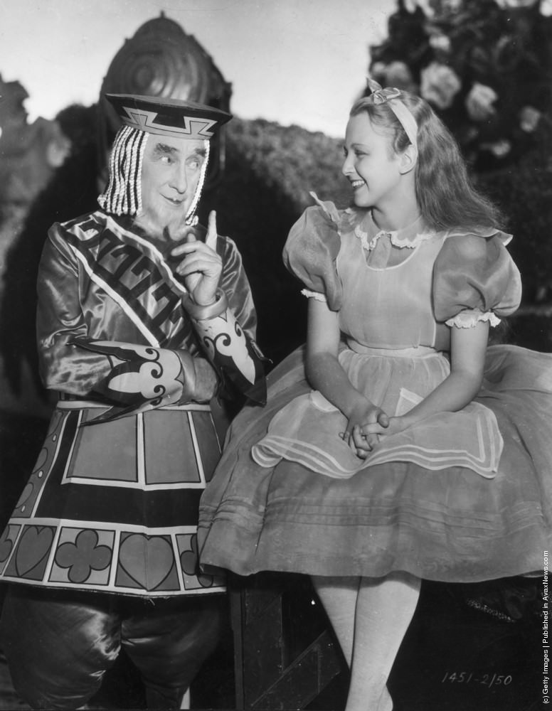 Charlotte Henry as Alice and Alec B Francis as the King of Hearts in Paramount’s “Alice in Wonderland,” 1933
