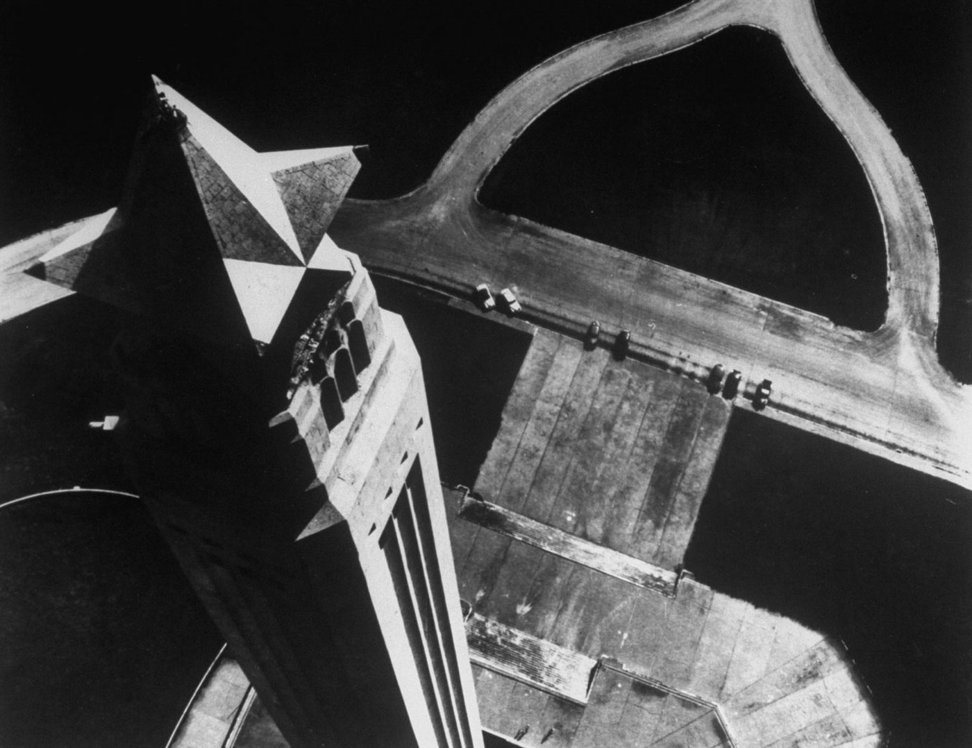 #21 Over the Texas star on the San Jacinto Monument near Houston, helicopter-borne camera looks sharply down 570-foot shaft to steps and parking space below. Tower marks spot where Sam Houston defeated General Santa Anna in 1836.