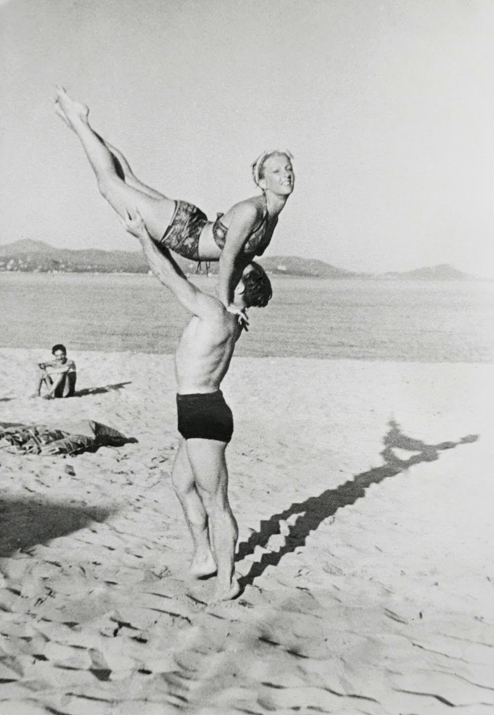 #4 Tania Riabouchinska and David Lichine on the beach, Monte Carlo, 1932.