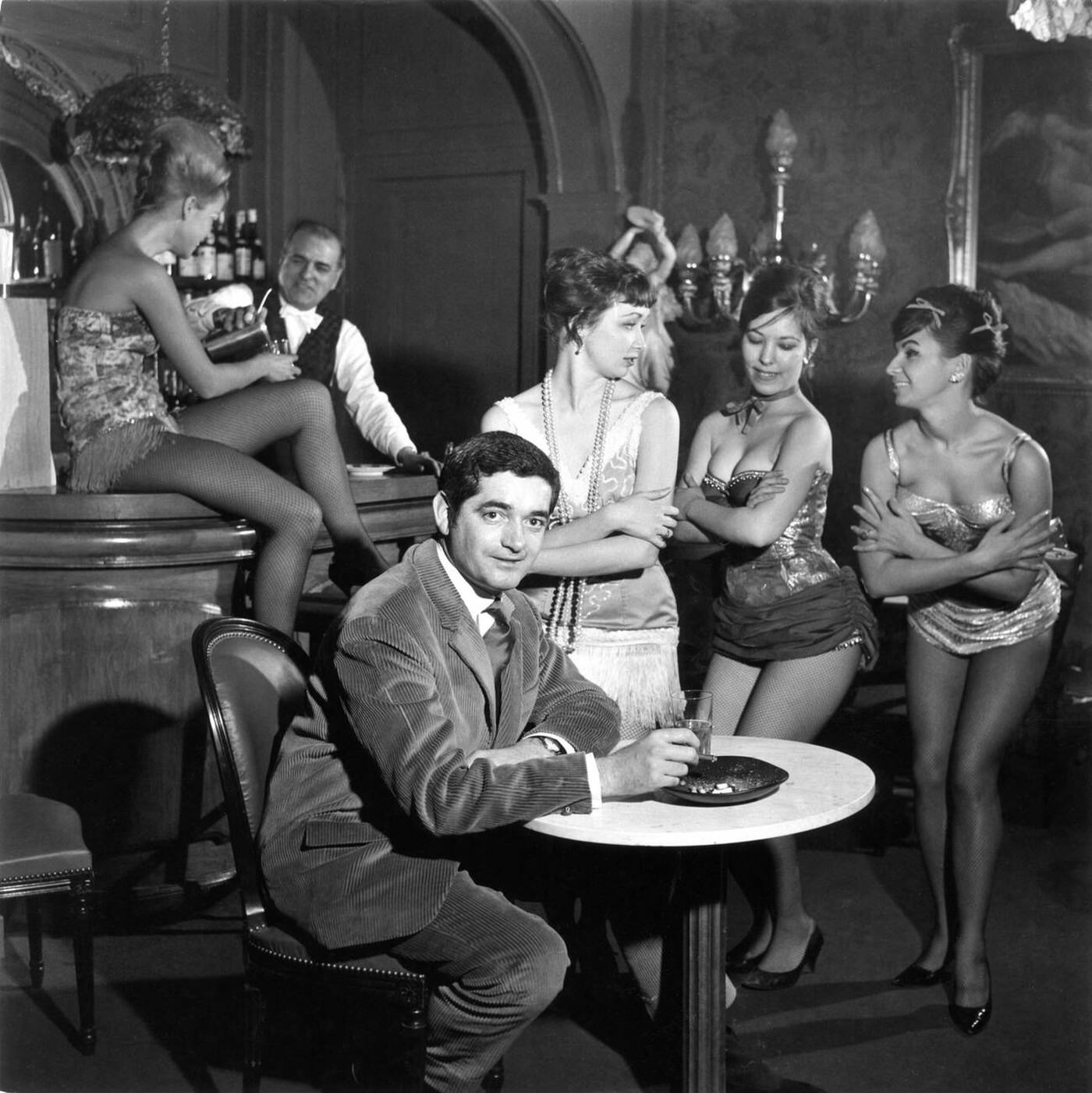 #47 Director Jacques Demy with the “Lola Girls” filming Lola, 1961.