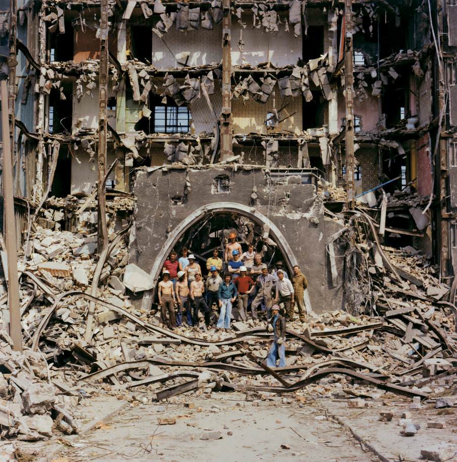 #12 Noel and his lads, demolition men, Quarry Hill Flats, summer 1978. ‘The last arch of Quarry Hill. Noel, with a real sense of occasion, got his men to pose for posterity.’