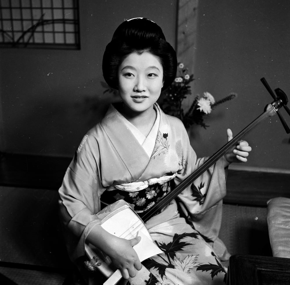 #3 A Japanese Geisha with her samisen, 1950s.