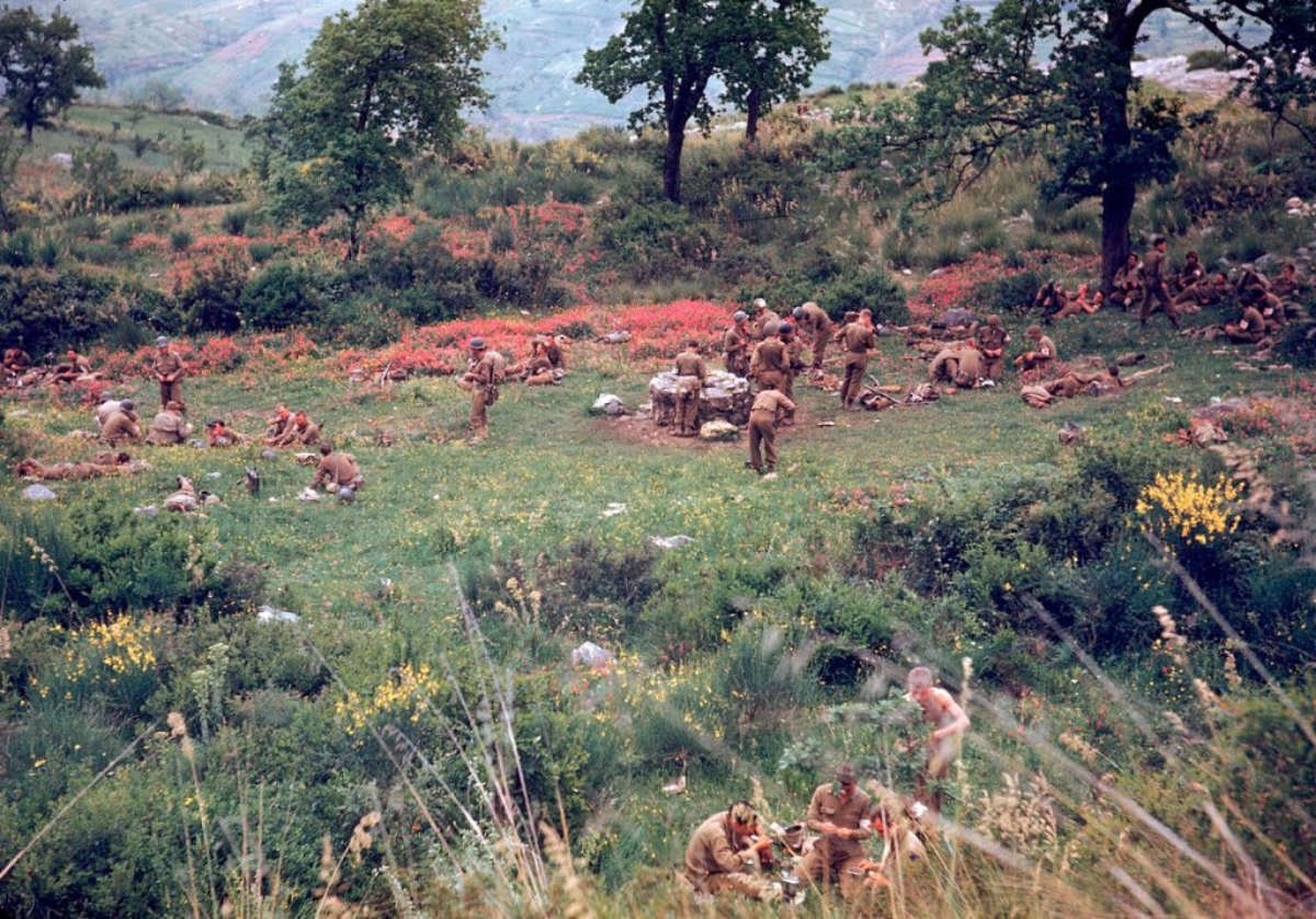 #18 American troops rested in a field during the drive towards Rome, 1944.