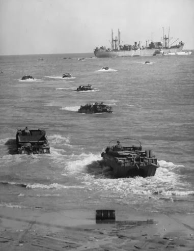 #28 Amphibious trucks ferrying supplies to Anzio beach, 1944.