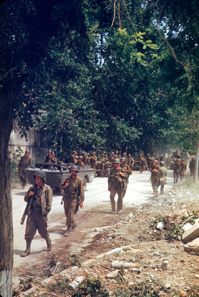 #3 American soldiers marched up the Appian Way during the drive towards Rome, World War II, 1940s.
