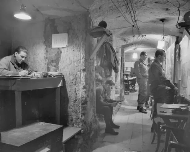 #32 American commanders in underground headquarters at Anzio, 1944.