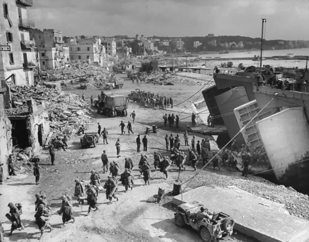 #33 LSTs unloading troops in Anzio harbor, 1944.