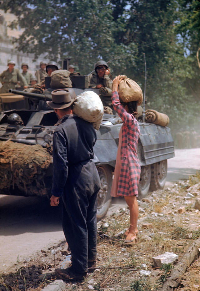 #4 Italians watched American armor pass during the drive towards Rome along the Appian Way, World War II, 1940s.
