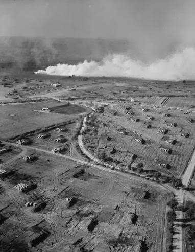 #42 Smoke rising from German lines during the fight for Anzio, 1944.