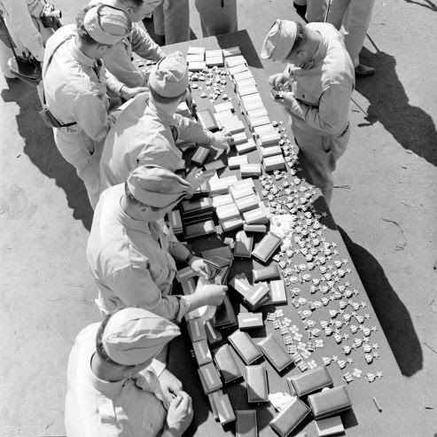 #44 Preparing for a medal ceremony at Anzio, 1944.