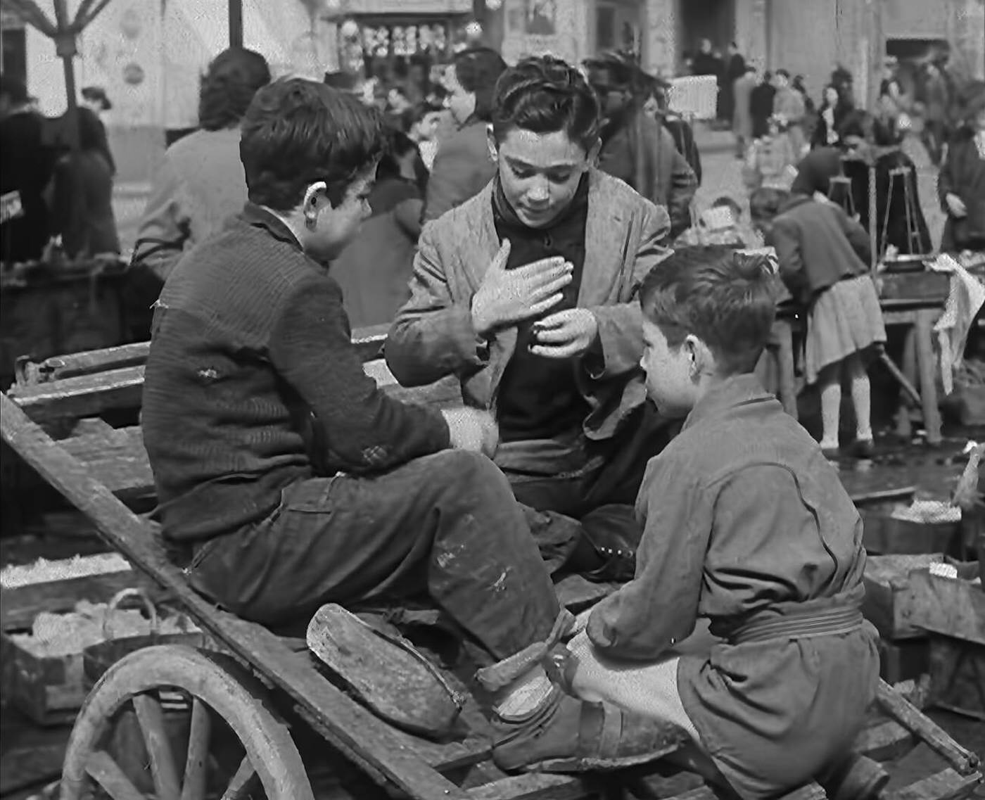 #63 Italian boys talking with civilians, 1944.