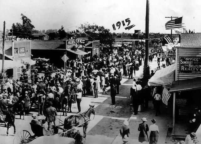#2 Independence Day in Bellflower, 1915. The folks in the street are watching men run a foot race. That street is now Bellflower Boulevard.