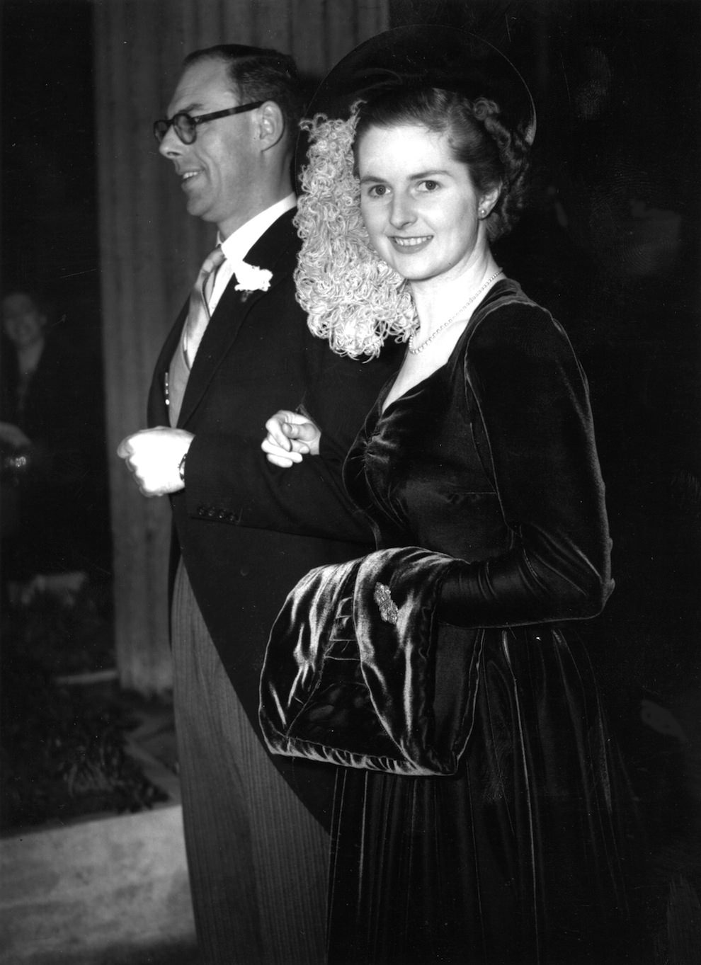 #14 Aged 26. On her wedding day to Denis Thatcher. Wearing a royal blue velvet dress, and a hat was trimmed with ostrich feathers.