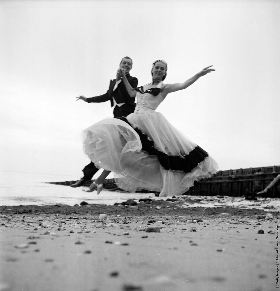 #13 Television dancers Boyer and Ravel dancing on the beach at Eastbourne, 1953.
