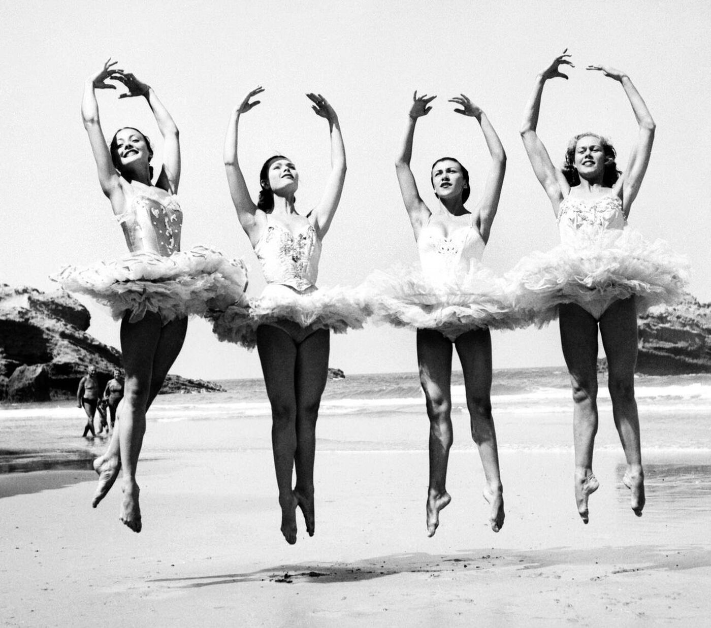 #29 Ballet dancers entertaining holidaymakers on a south coast beach.