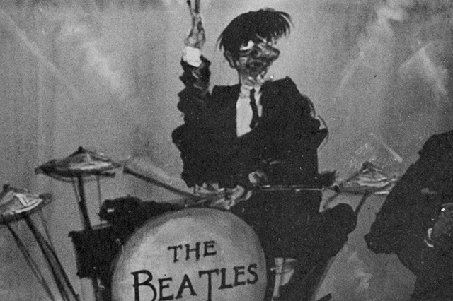 A painting of one of the Beatles.