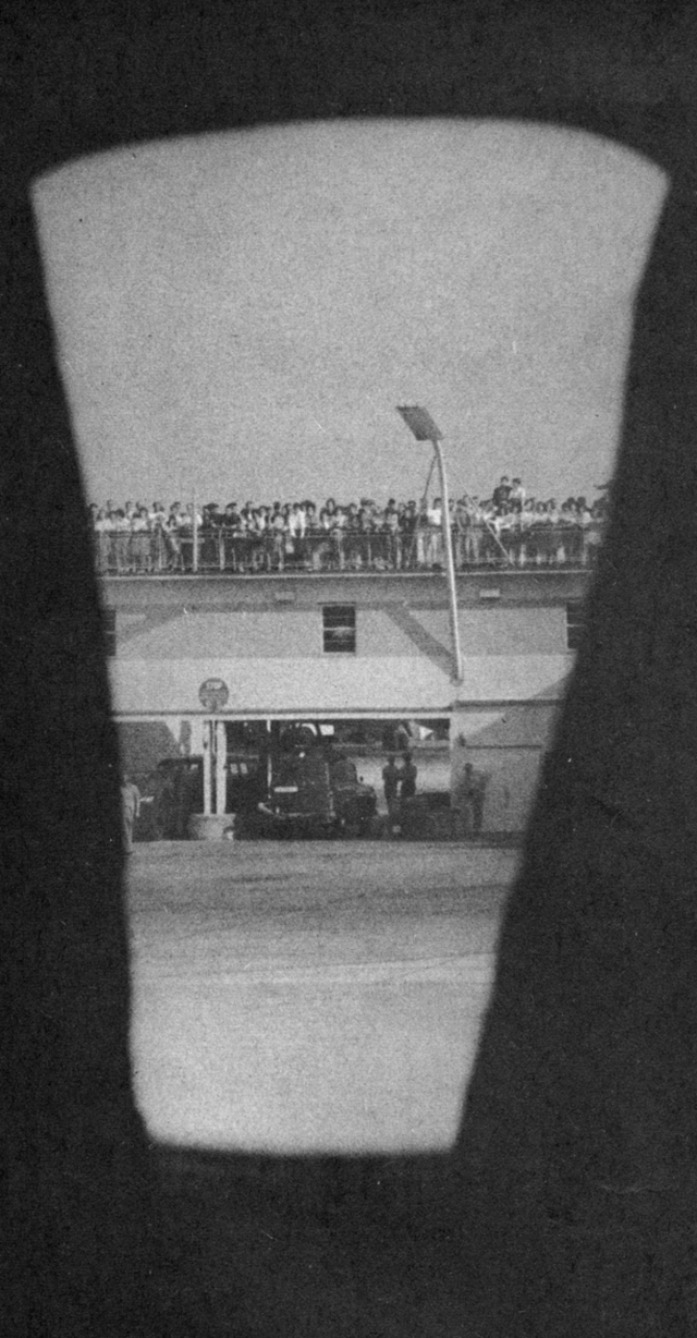 Fans cheering the Beatles from a plane.