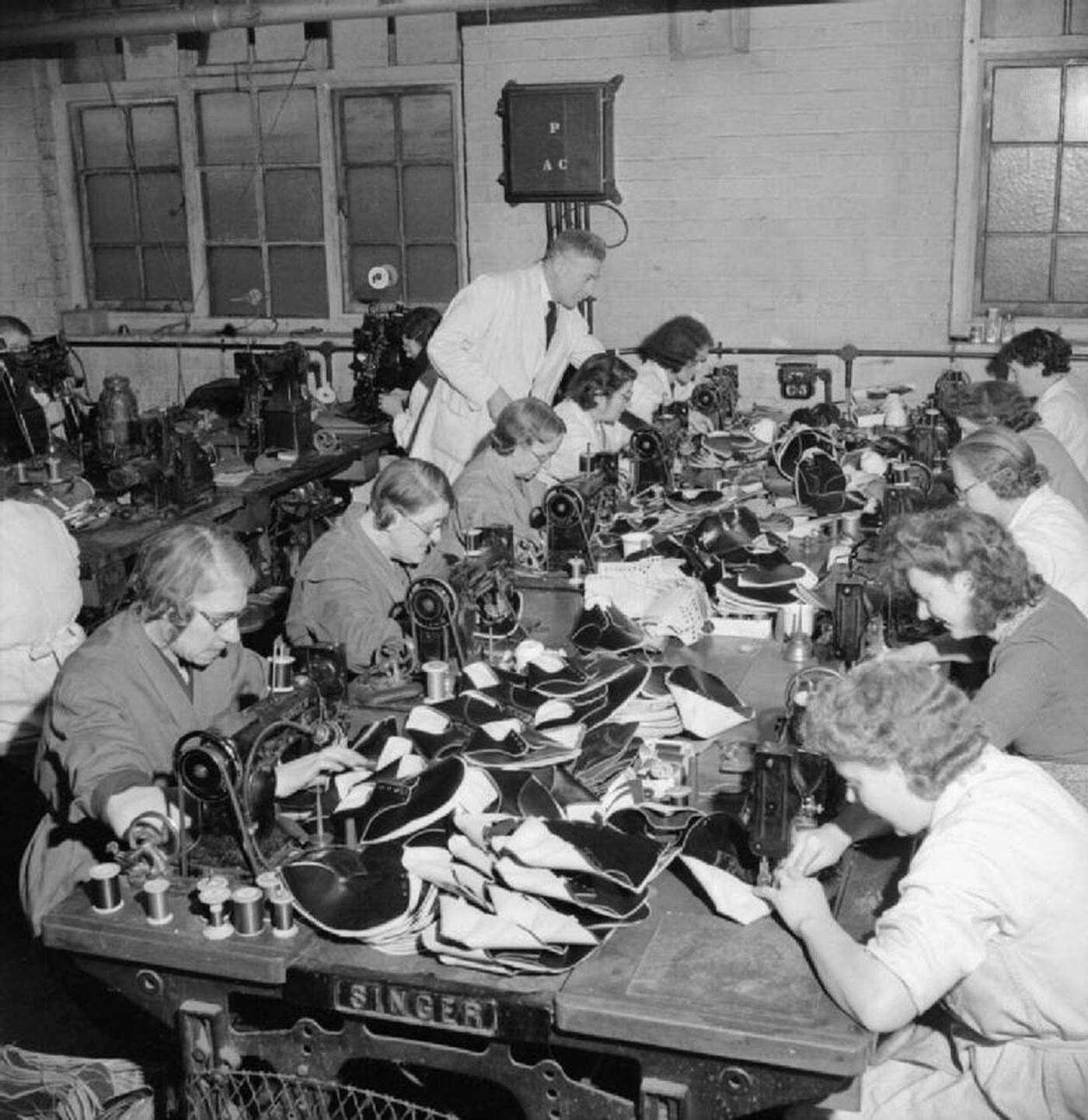#110 Machinists sewing shoe parts, World War II