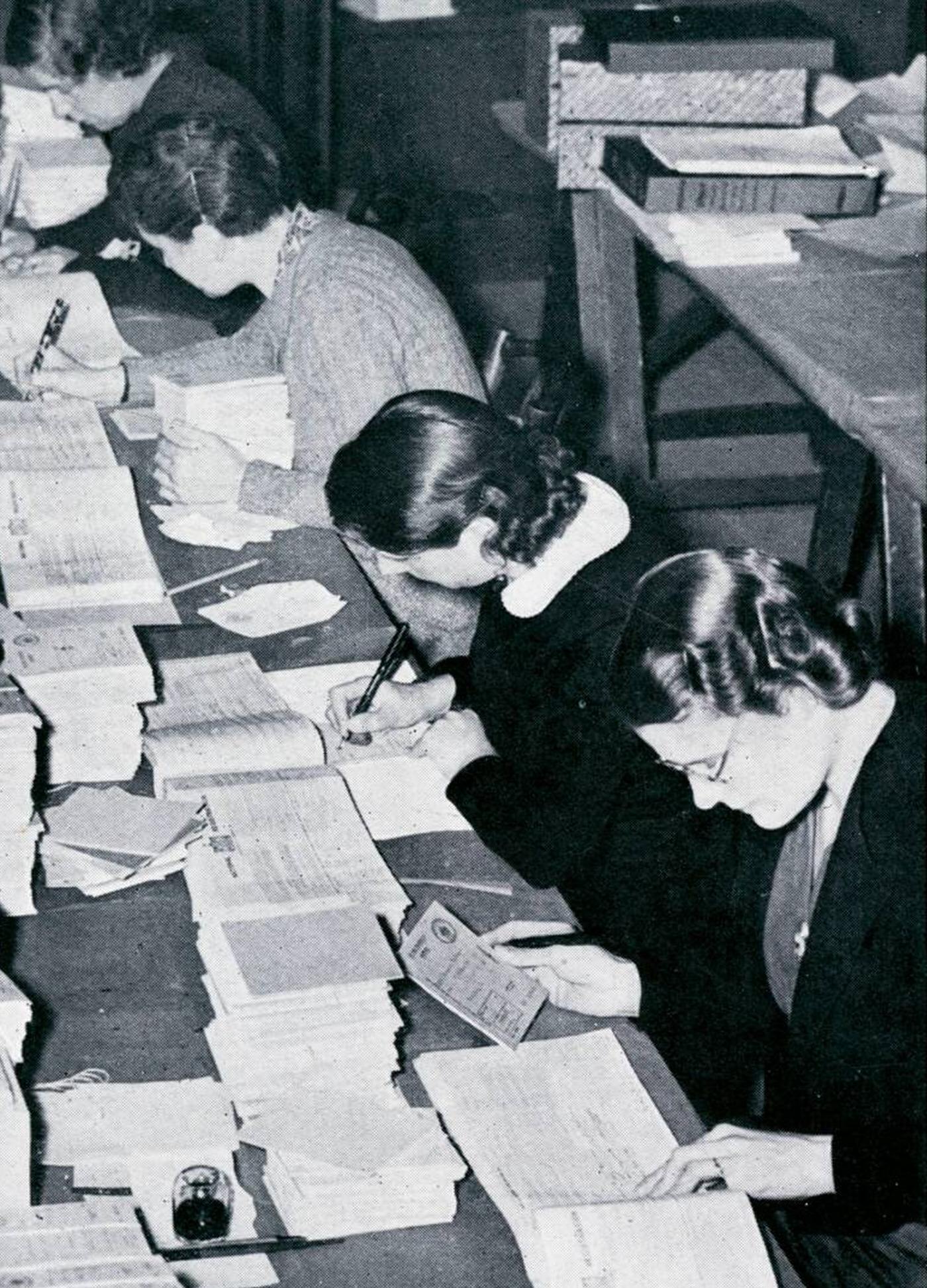 #116 Filling in ration books, 1939