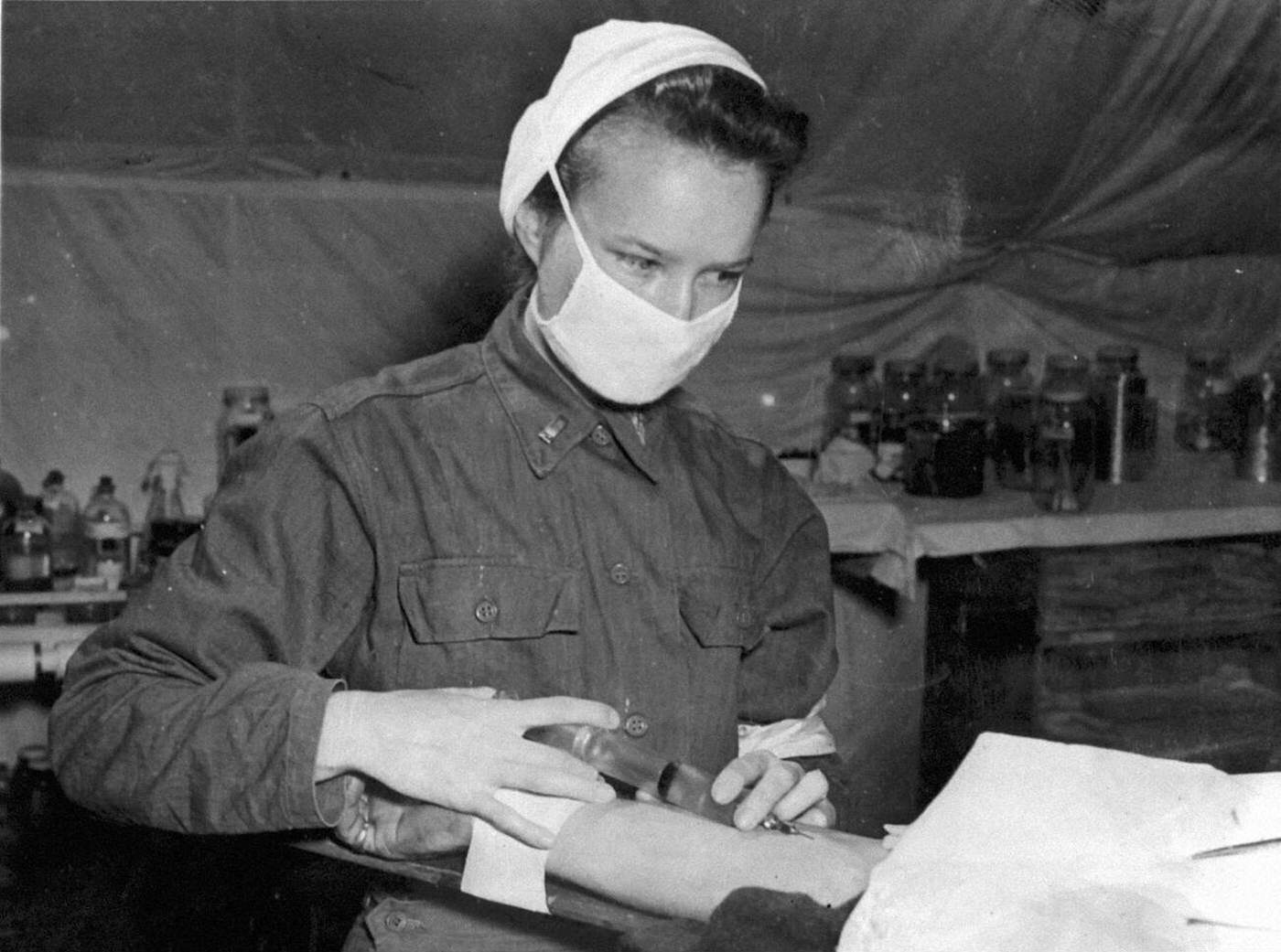 #121 A battlefront nurse in Normandy, 1944