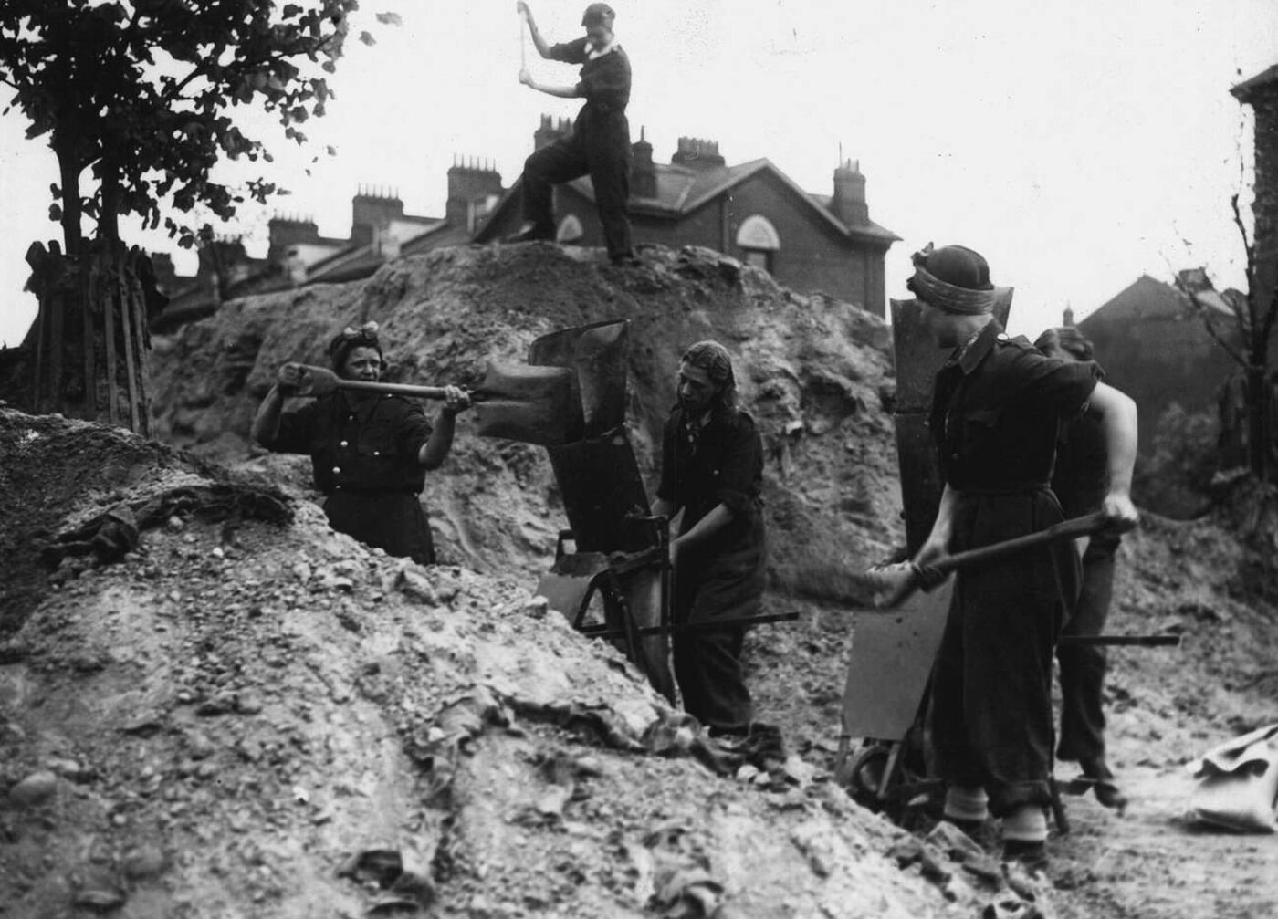 #141 Women clearing raid debris, 1941