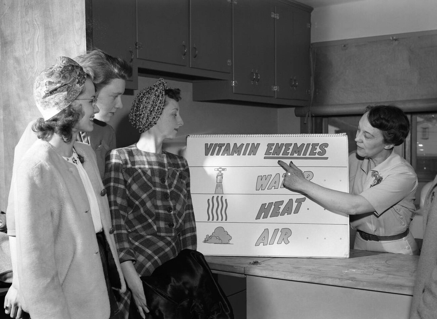 #75 Ida Lansden discussing food preservation, 1943