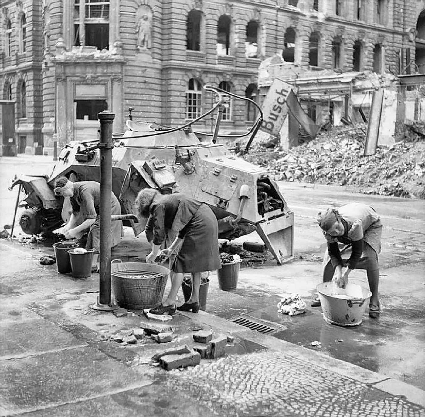 #76 German women doing laundry in Berlin, 1945