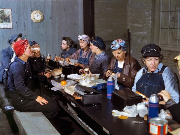#21 Women employed as roundhouse wipers having lunch, Chicago & North Western Railroad, Clinton, Iowa. Marcella Hart is at left, Mrs. Elibia Siematter at right. April 1943. 4×5 Kodachrome transparency by Jack Delano.