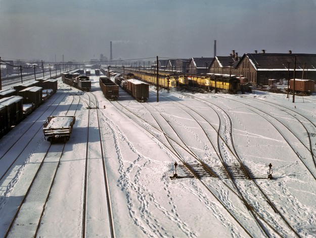December 1942. Three West Coast streamliners in the Chicago &; North Western yards at Chicago. 4×5 Kodachrome transparency by Jack Delano.