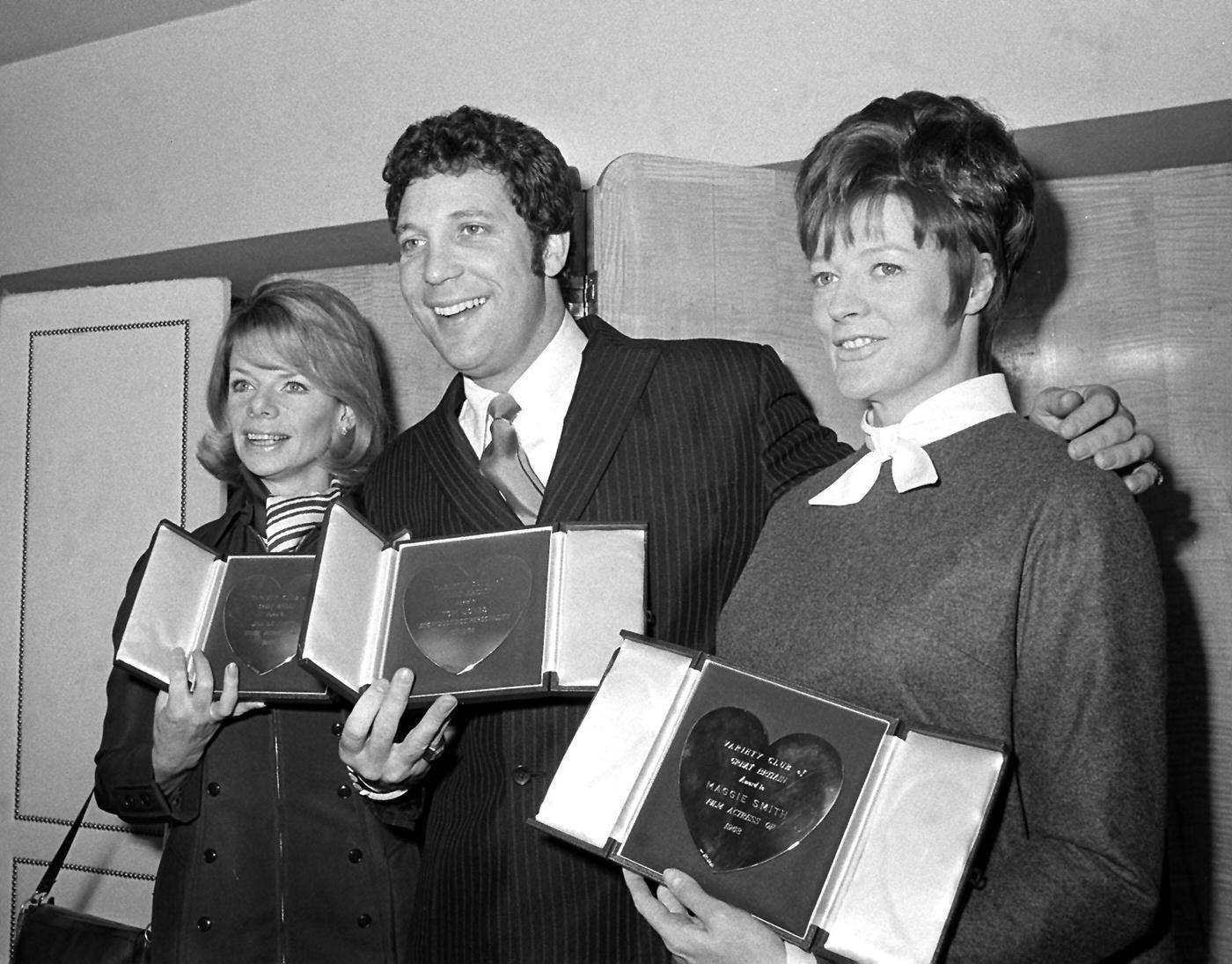 Jill Bennett, Tom Jones, and Maggie Smith with their show business awards presented by the Variety Club of Great Britain, 1969.