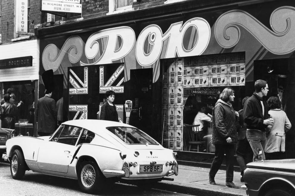 #9 8 April 1968: A Triumph Spitfire GT6 parked outside Pop boutique.