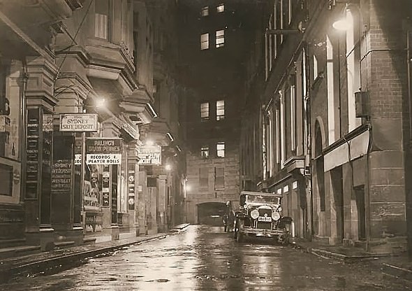 A wet Angel Place in Sydney, 1930s.