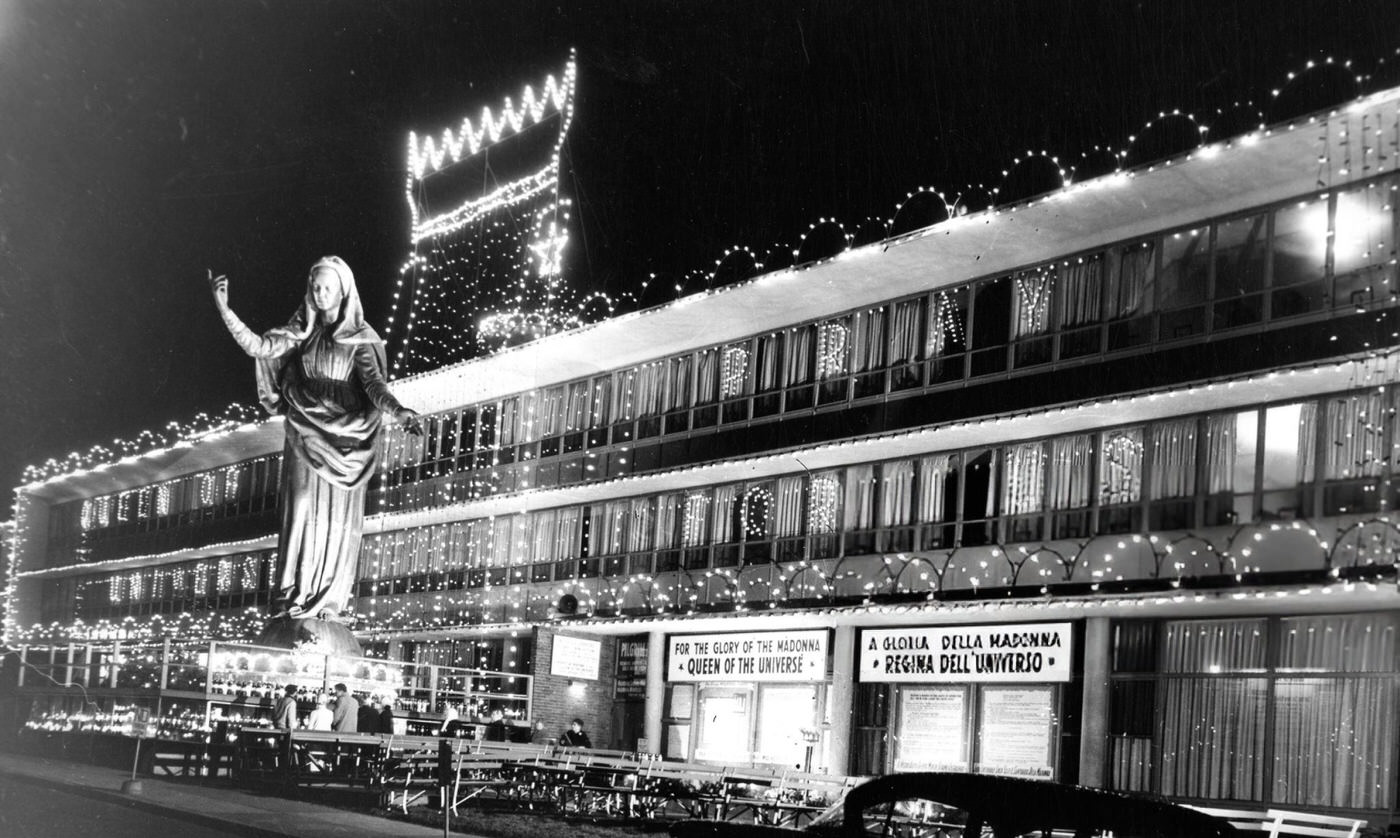 #20 Christmas lights adorn the Don Orione Home and Madonna shrine in East Boston, 1959.