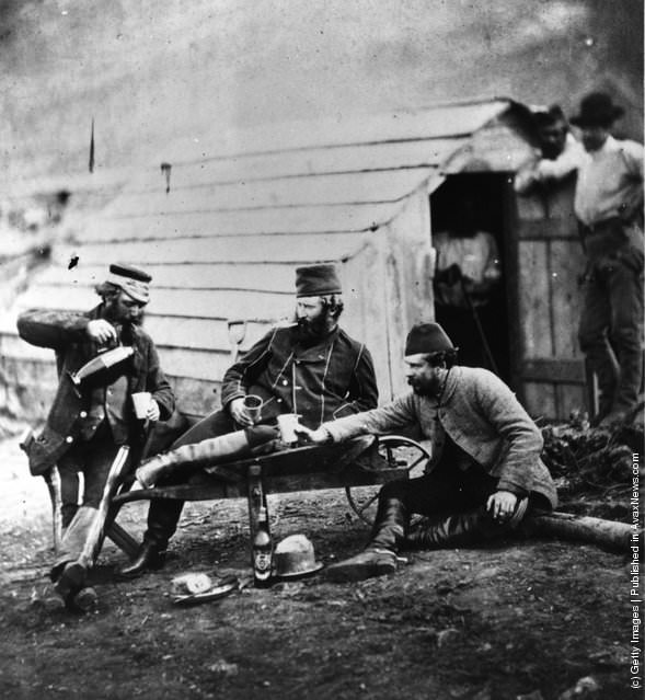 #13 Captain Brown, Colonel Lowe, and Captain George in their Crimean War camp, 1850s.