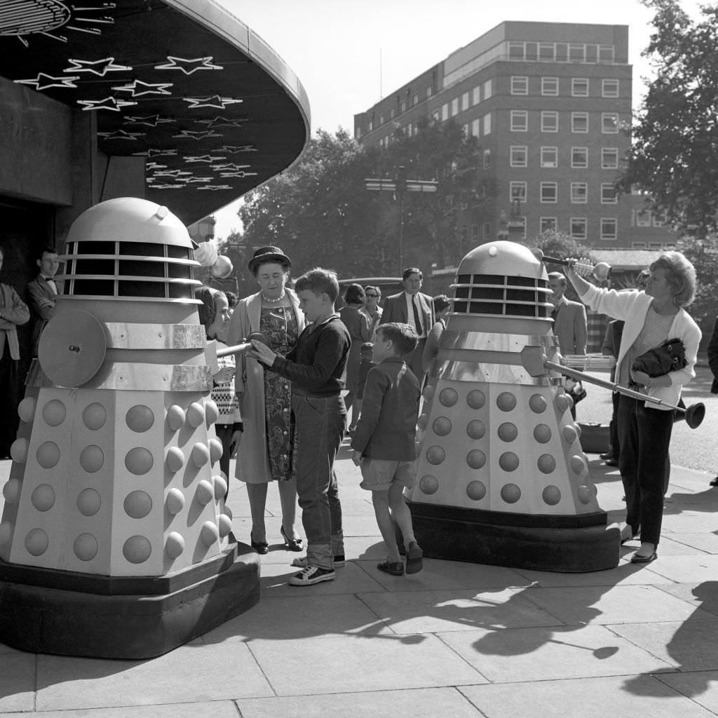 Children meeting robot Daleks outside the Planetarium, Baker Street, 1964.