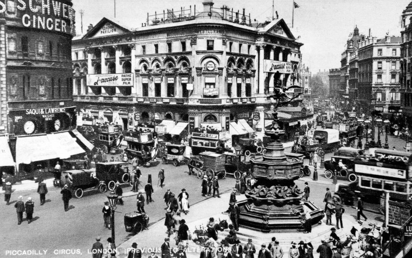 #25 Piccadilly Circus, London, with the London Pavilion cinema showing “Pathe Super Film J’accuse”, 1920s.