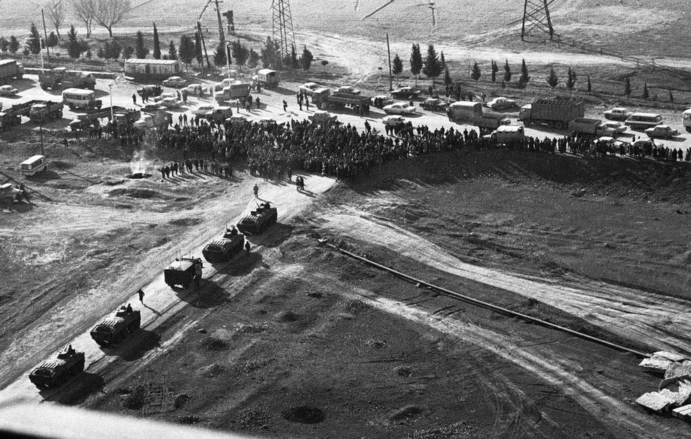 #5 A crowd blocks Soviet tanks on a road near Ganja, Azerbaijan, 1990.